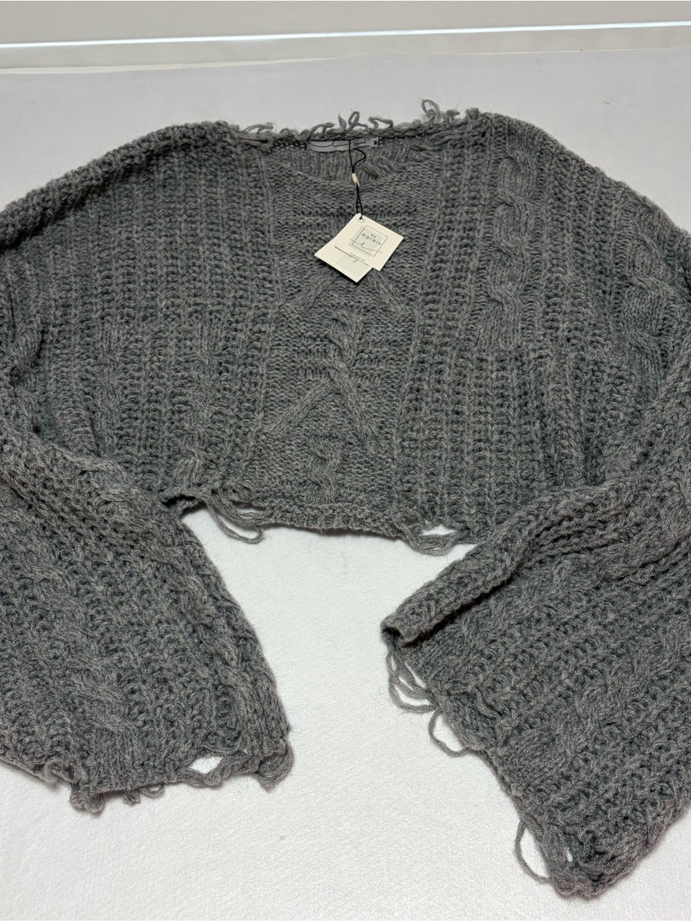 By Egreis Isabella Sweater NWT Size M Gray Cable Knit Cropped Distressed Hem